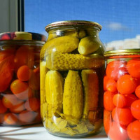 Canned cucumbers and tomatoes
